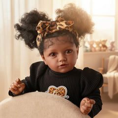 Babeside leopard outfit and bow highlight cute styling.