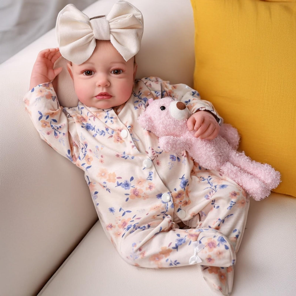 BABESIDE Reborn doll face close-up with realistic eyes for imaginative play.