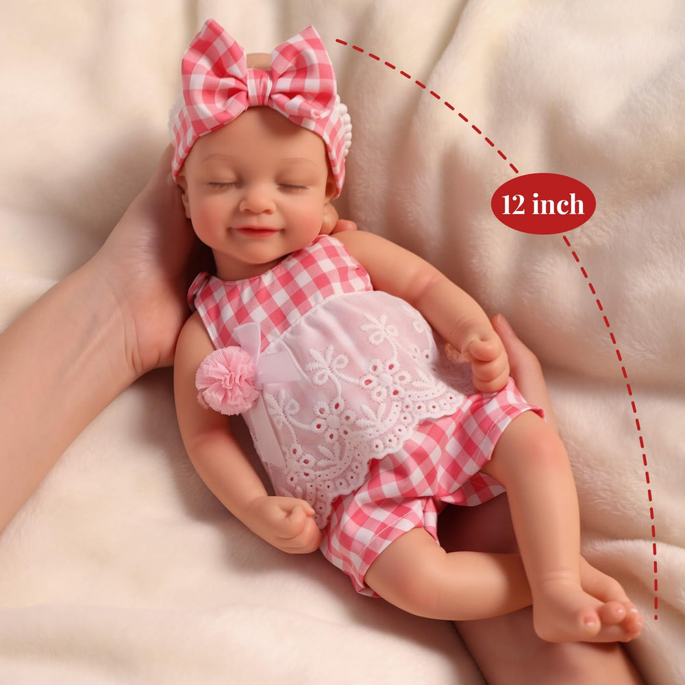 BABESIDE swaddle, diaper, and clothes ready for play outfits.