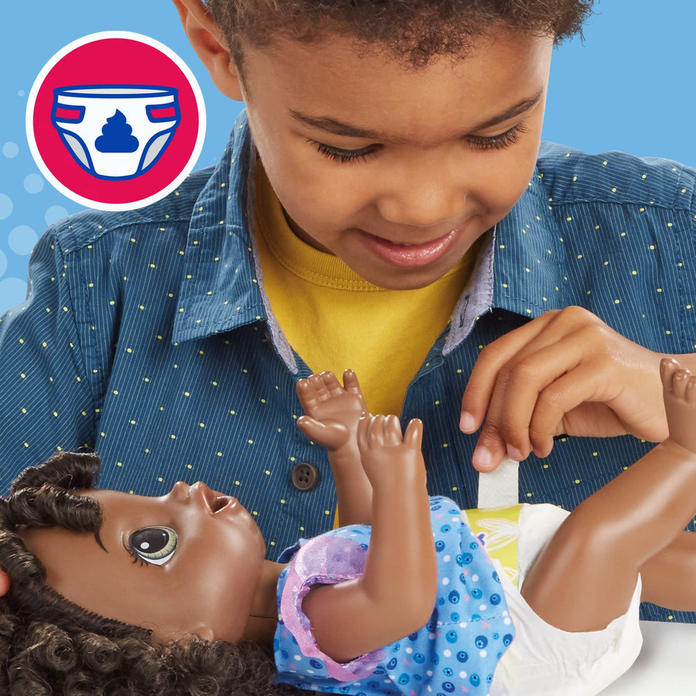 Removable dress and comb from Baby Alive for dress-up grooming play.