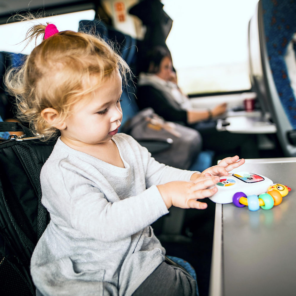 Cause-and-effect learning as babies press the big button on Take Along Tunes.