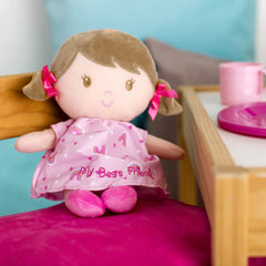 Dorie plush doll close-up highlights embroidered features and soft fabric for comforting play.