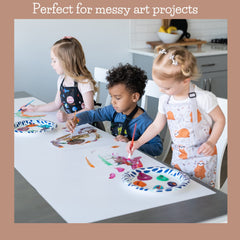 BABYBOET cosmic apron painting setup highlights vibrant colors and mess control