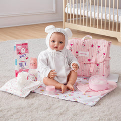 BABESIDE doll changing pad provides a clean care surface.