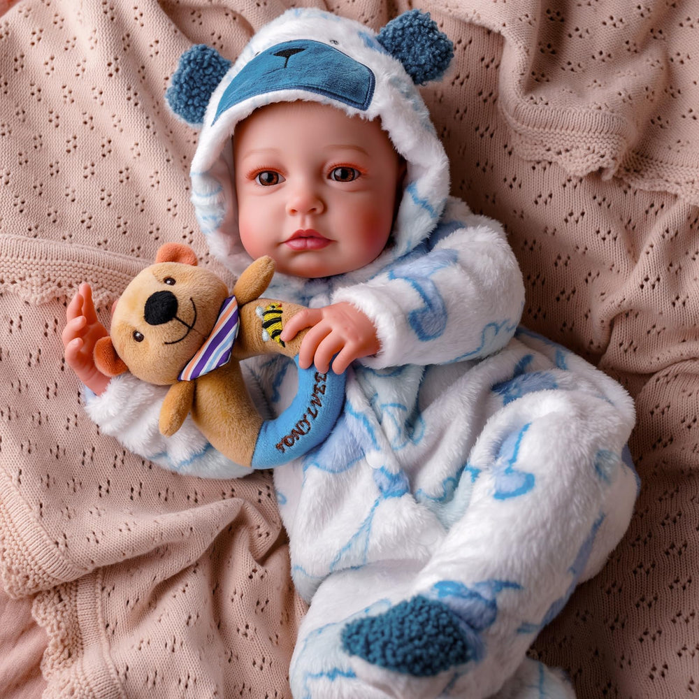 BABESIDE soft cloth body with vinyl skin for cuddly comfort.