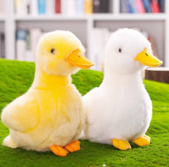 Backlood Toys 8-inch yellow duck plush back view, compact and portable for on-the-go play