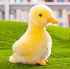 Backlood Toys 8-inch yellow duck plush side view, fluffy texture ideal for cuddles