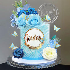 BANBALLON blue butterflies cake topper for whimsical detail.