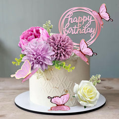 BANBALLON butterfly cake toppers with purple flowers adorn an elegant birthday cake.