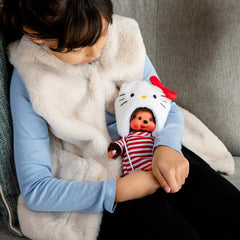 Bandai Monchhichi Hello Kitty plush packaging with vintage-inspired look.