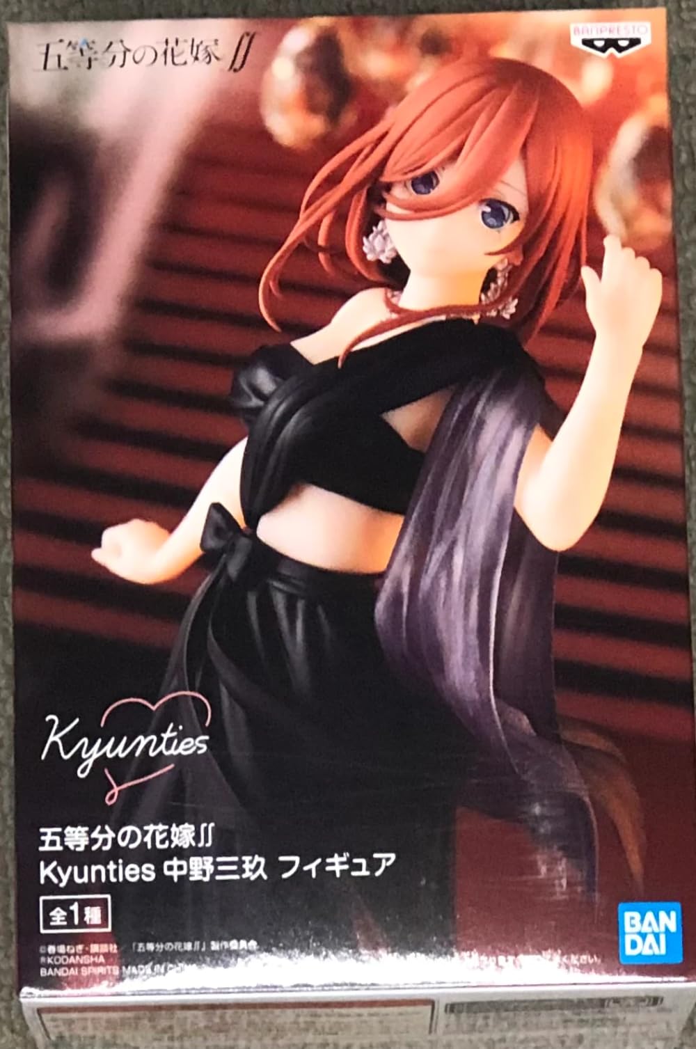 Banpresto Quintessential Quintuplets Miku Nakano figure on base stand for stable display.