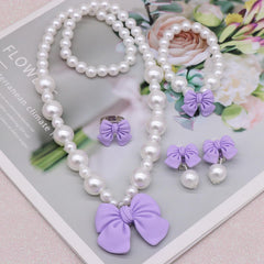 BAOBAOJOY purple bow ring adds glitter to pretend princess looks.