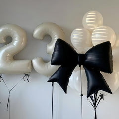 Baoonworlld aluminum foil balloon with self-sealing valve for quick inflation and reusable decor.