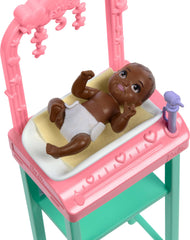 Barbie and baby doll patient in a care scene for compassionate play