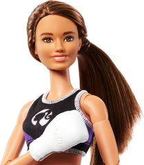 Barbie boxer doll with removable uniform for mix-and-match play outfits.