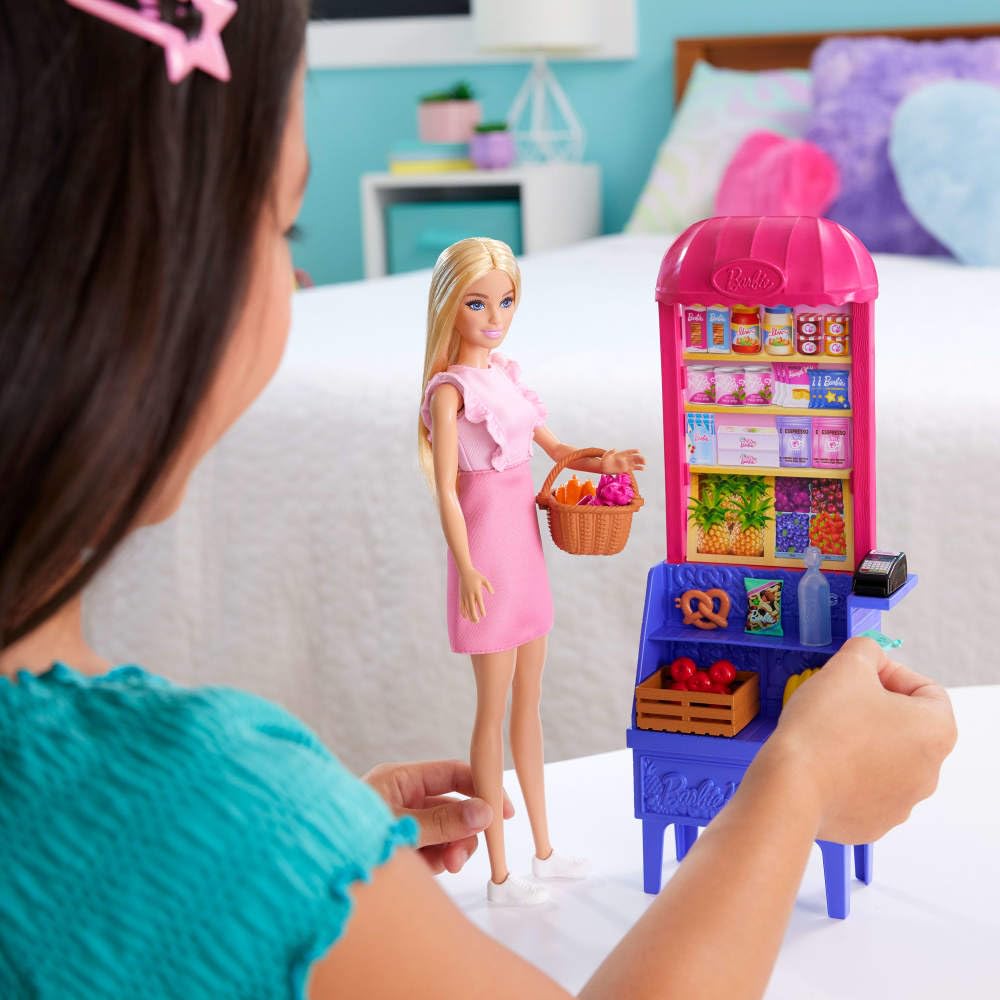 Barbie card scanner accessory enabling pretend checkout interactions.