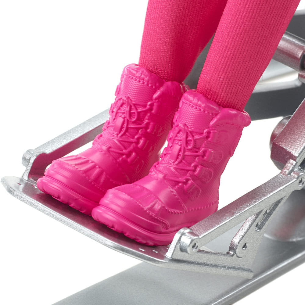Barbie Careers outriggers skis, authentic equipment for storytelling on snowy adventures.