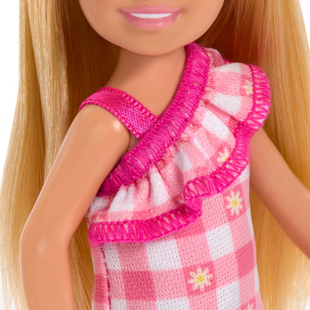 Chelsea doll in pink shoes and dress suitable for mix-and-match outfits.