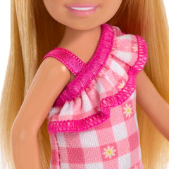 Chelsea doll in pink shoes and dress suitable for mix-and-match outfits.