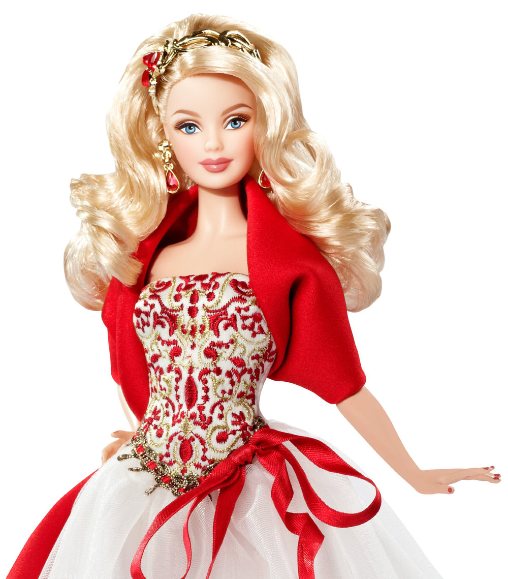 Barbie Holiday Doll 2010 features magnificent headpiece and chandelier earrings for festive charm.