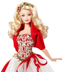 Barbie Holiday Doll 2010 features magnificent headpiece and chandelier earrings for festive charm.