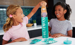 Barbie Color Reveal water activation reveals teal doll after warm swirl.