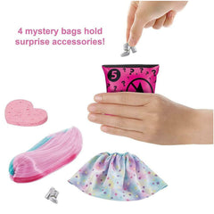 Barbie Color Reveal tube water reveal creates shimmering pink effect