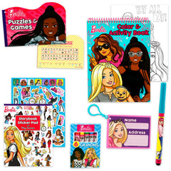 Close-up of Barbie coloring books and crayons for imaginative drawing sessions