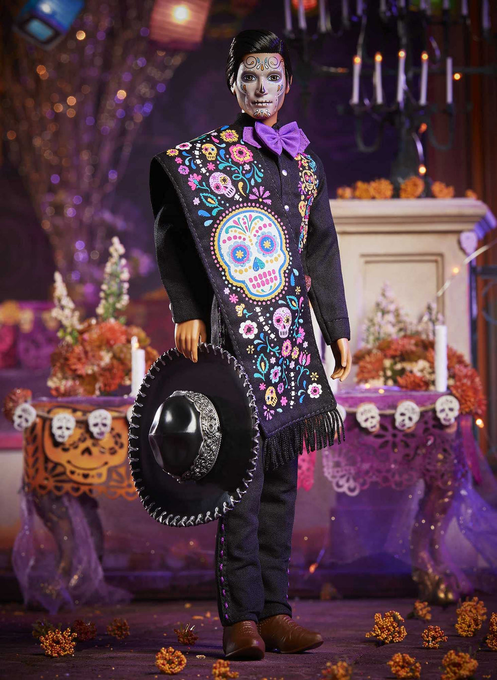 Barbie Dia De Muertos Ken doll with serape and vibrant bowtie.