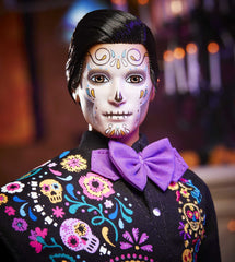 Ken doll with sugar skull design on sombrero and calavera face.