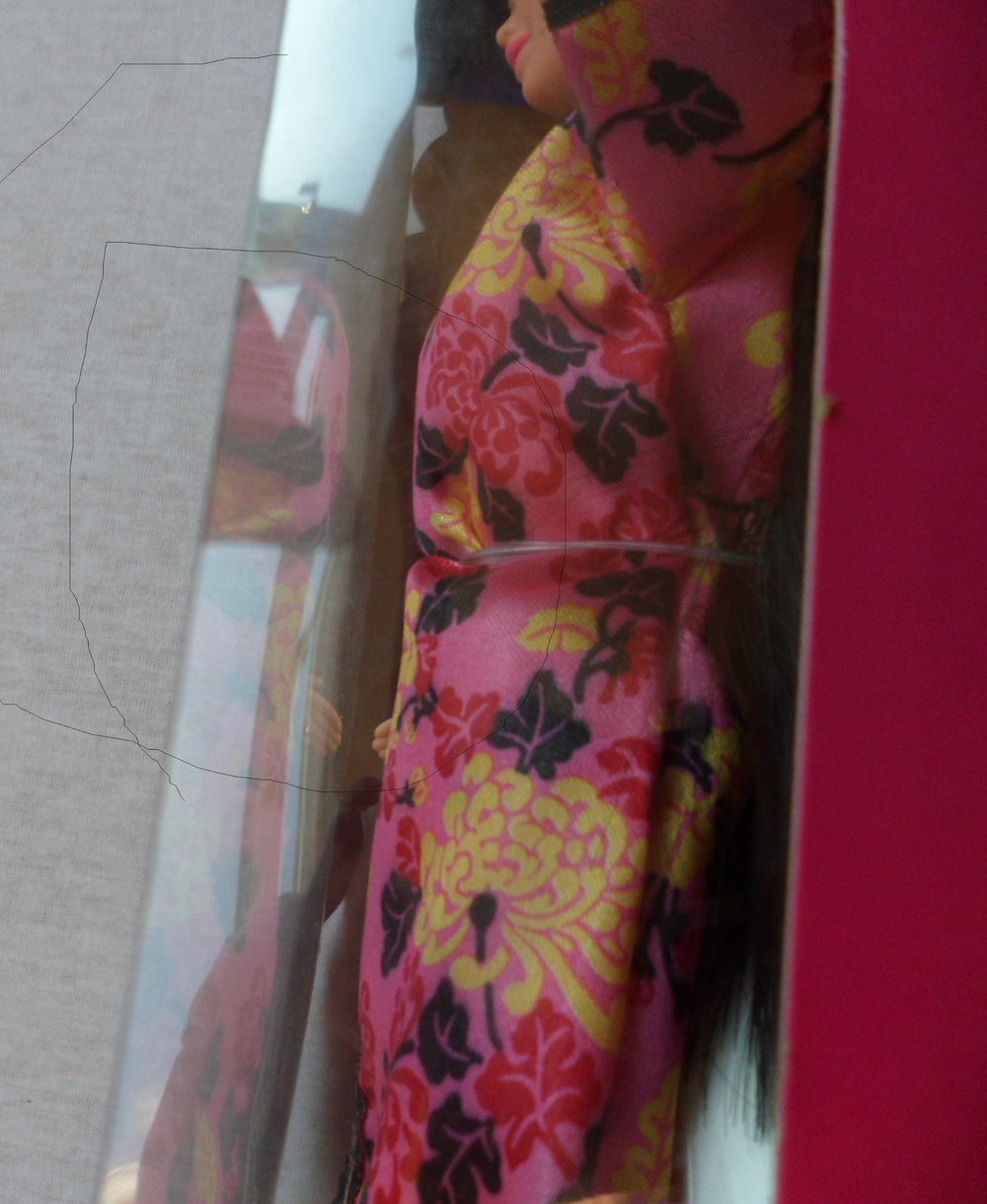 Dolls of the World collection featuring Barbie in Chinese-inspired costume.
