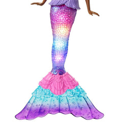 Barbie Dreamtopia press bodice button for light shows ashore, no water needed.