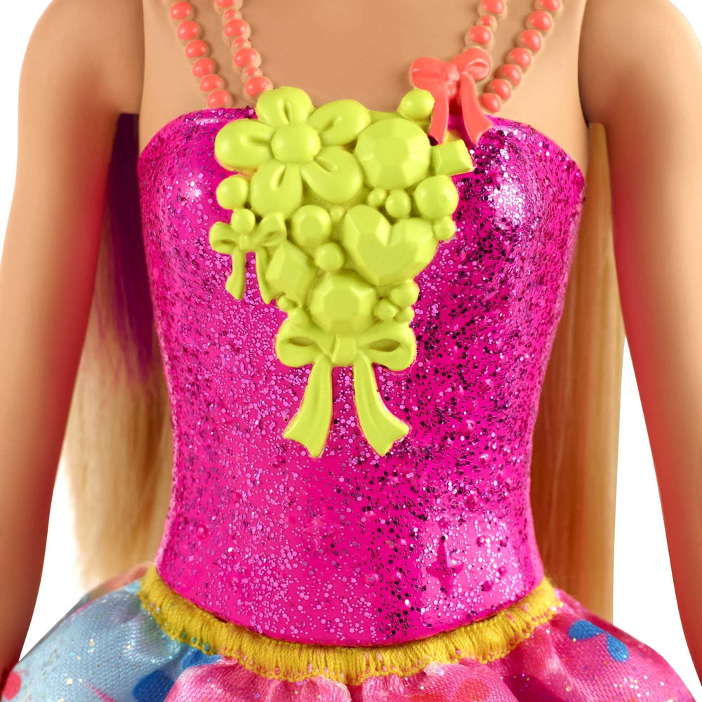 Barbie Dreamtopia pink headband completes her whimsical royal style.