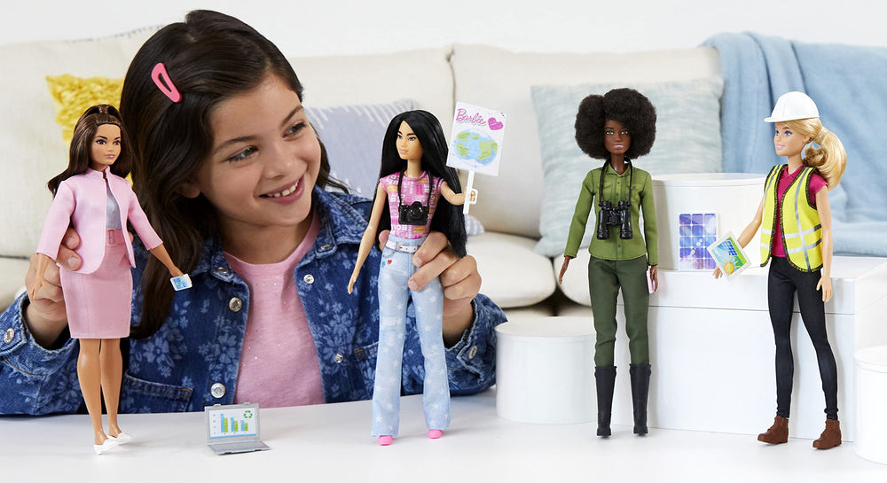 Barbie Eco-Leadership Renewable Energy Engineer with solar panel demonstrates sustainable power ideas.