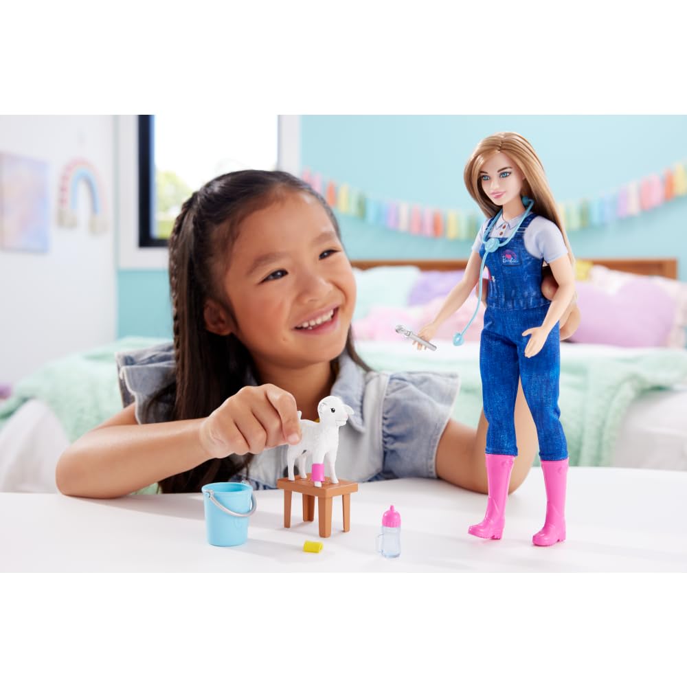 Barbie farm vet doll wears overalls and pink boots for authentic pretend care.