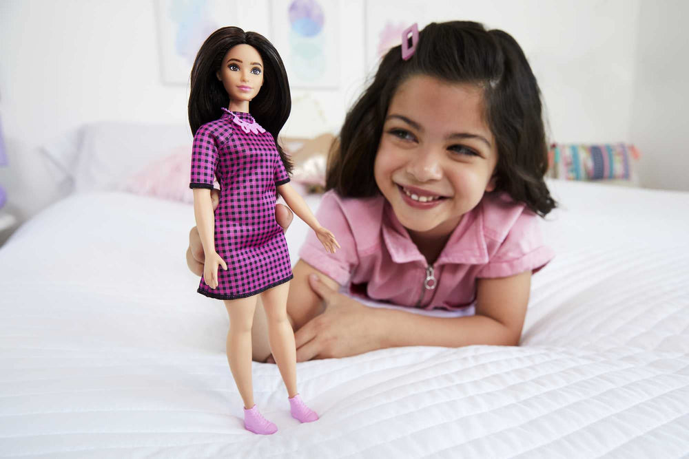 Barbie Fashionistas curvy doll #188 with black hair and pink sneakers, great for modern styling stories.