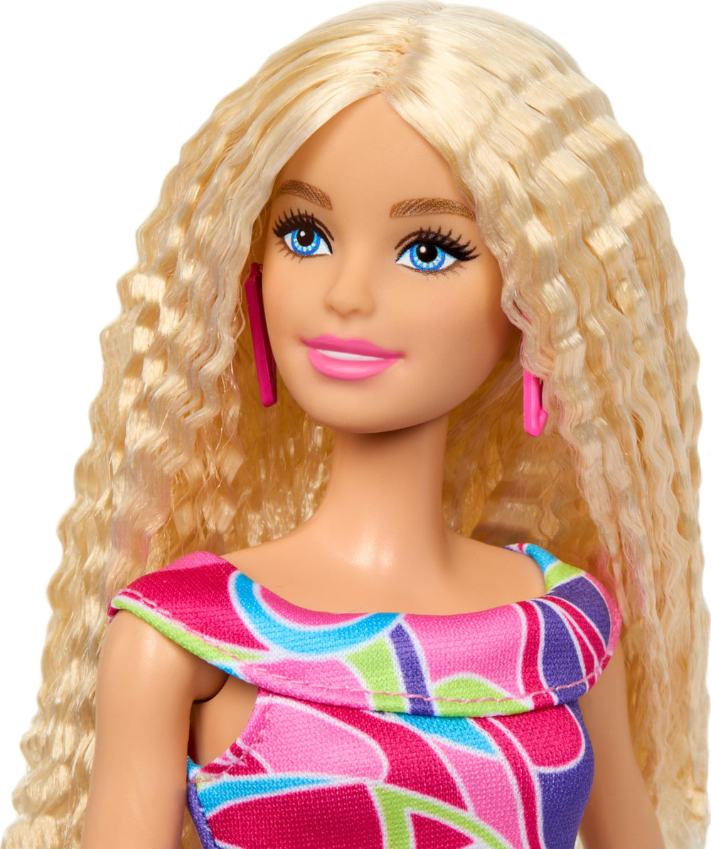 Barbie Fashionistas Doll #223 colorful printed dress for versatile styling options.