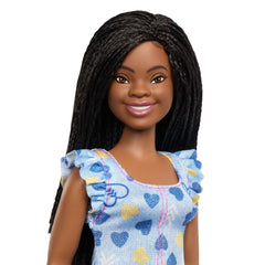 Barbie Fashionistas doll featuring black braided hair for versatile styling.