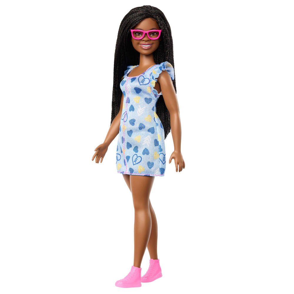 Barbie Fashionistas doll with Down syndrome wearing heart-print dress for inclusive play.