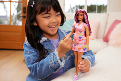 Barbie Fashionistas doll wearing heart-shaped sunglasses for chic play