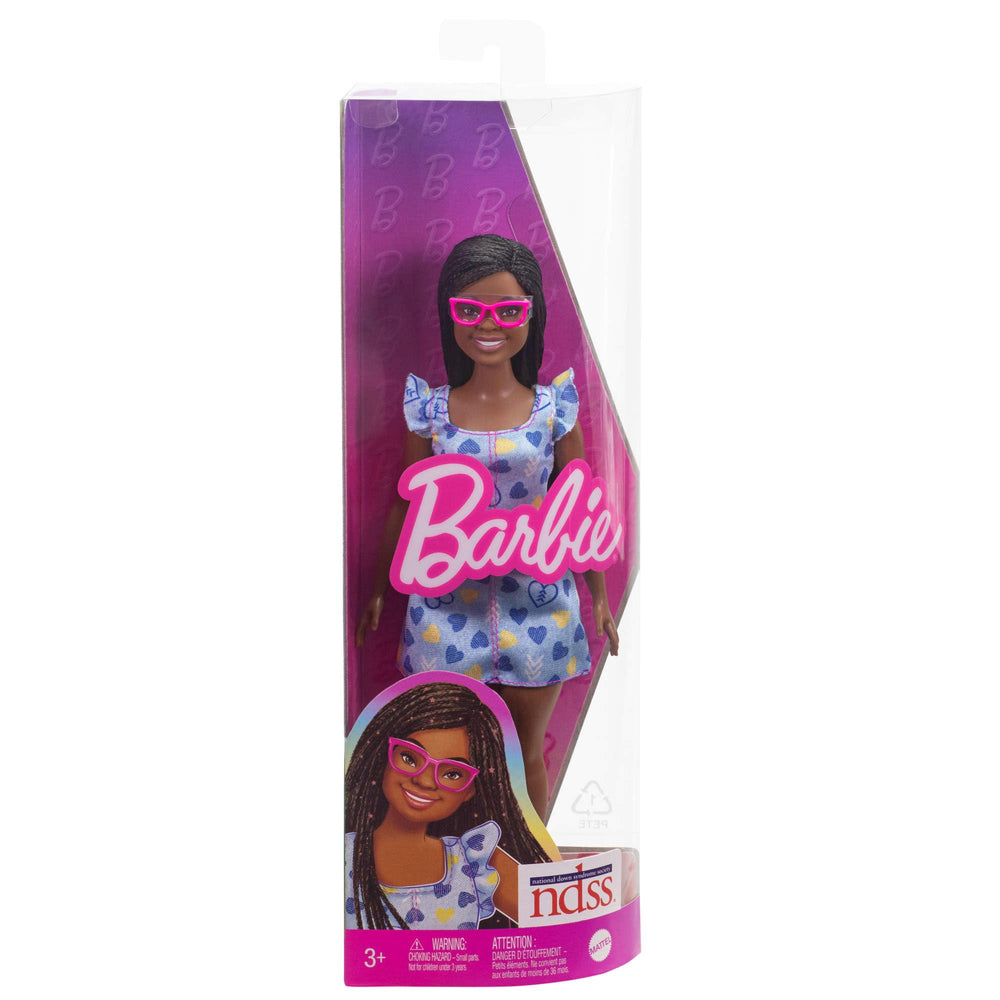 Barbie Fashionistas doll in a trendy outfit ensemble for storytelling and fashion play.
