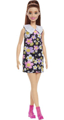 Barbie Fashionistas #187 with behind-the-ear hearing aids for inclusive storytelling.