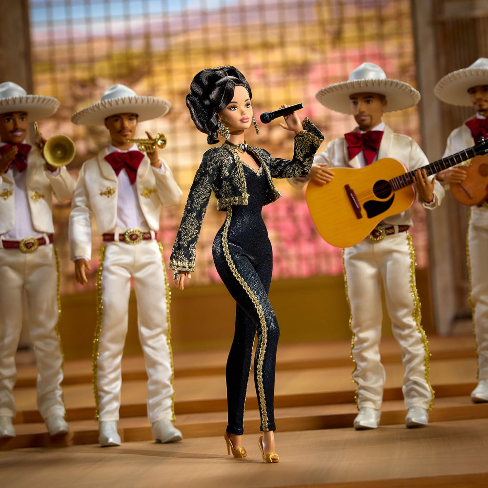 Barbie Juan Gabriel doll with microphone and bolo tie accessory for performance motif.
