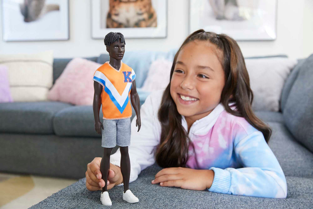 Barbie Ken Fashionistas 203 in orange jersey, ideal for active play.