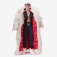 Ken doll from Barbie The Movie with black fringe vest and bandana for fan display.