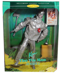 Barbie Ken as the Tin Man in a metallic outfit, ideal for display.