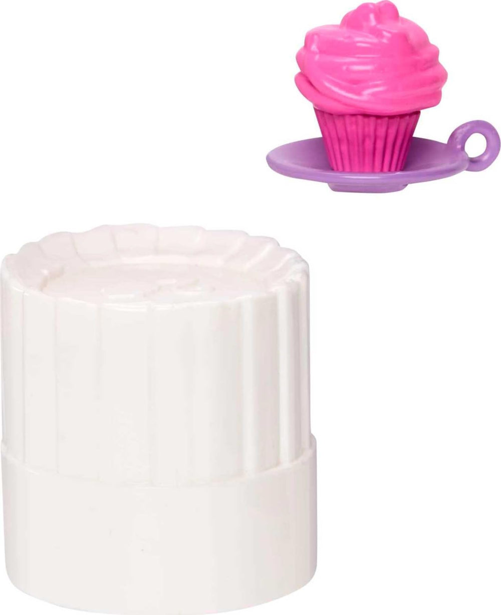Barbie kitchen playset scene inspires family cooking imagination.