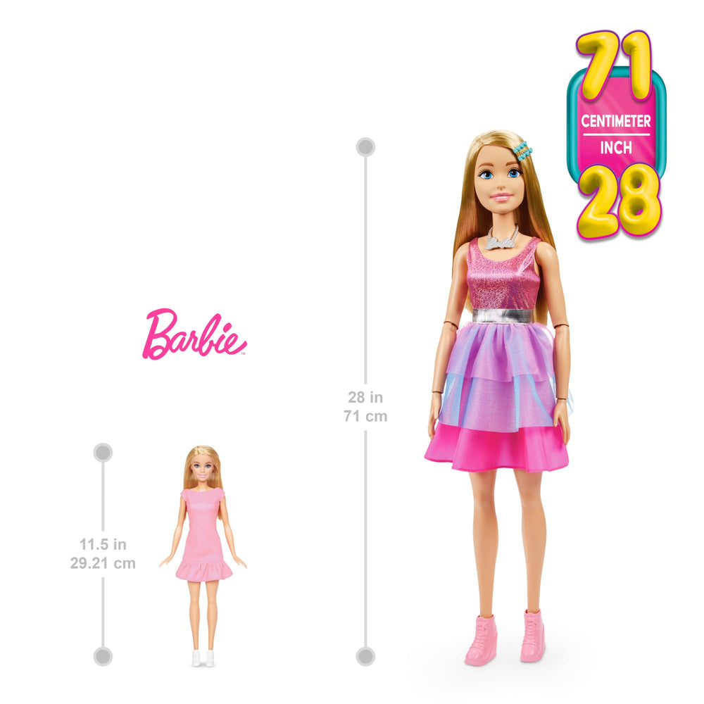 Barbie pink booties finish the outfit for a chic look.