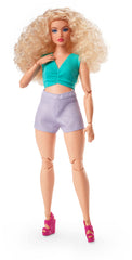 Barbie Looks doll with curly blonde hair, ideal for stylish play and pose-ready photos.
