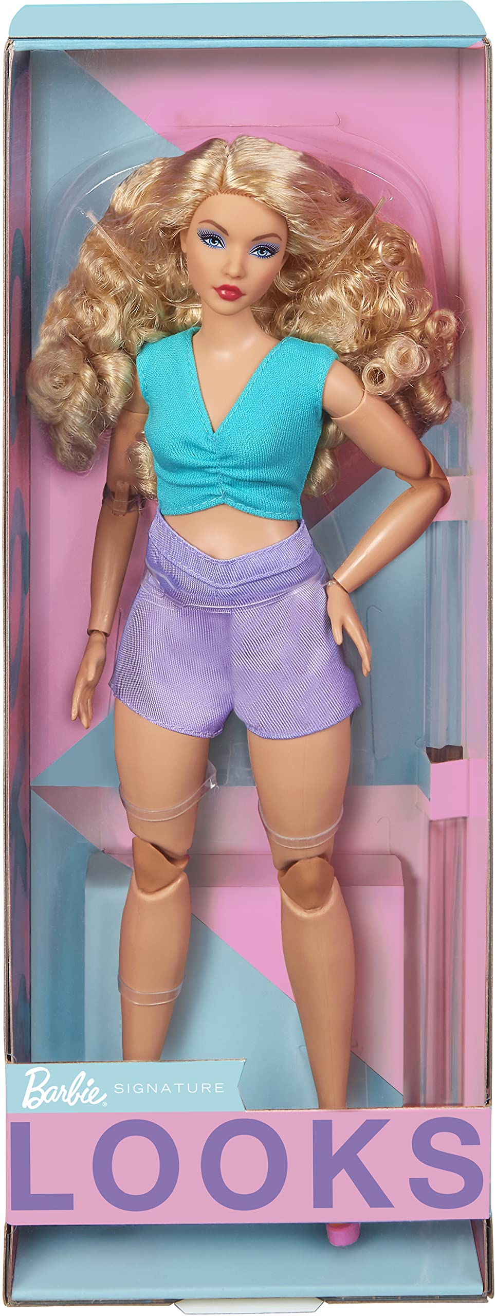 Barbie Looks doll stand and certificate of authenticity for display and collection.